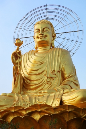 The golden Buddha statue in Dalat, Vietnam.の写真素材