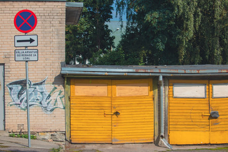 Old yellow garage on the street of the city. Russia, Moscowの写真素材