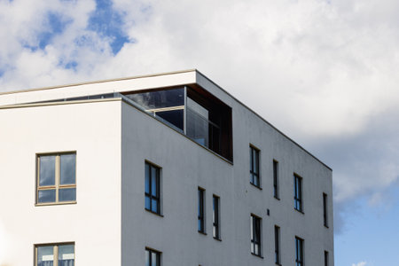 Modern apartment buildings on a sunny day with a blue sky. Facade of a modern apartment building
