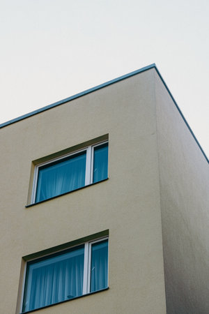 Detail of a modern apartment building. Fragment of the facade.