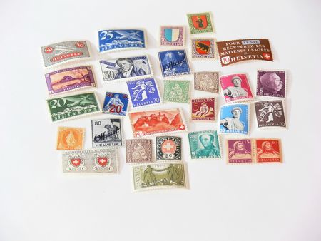 Stamps  60271An collection of stamps from Switzerland on white background.					の写真素材