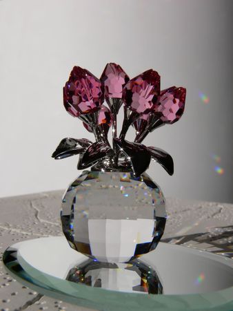 Crystal flower  60559.		An beautiful crystal ball with red tulips on, in sunshine with the colorful	sparkle all around.	の写真素材