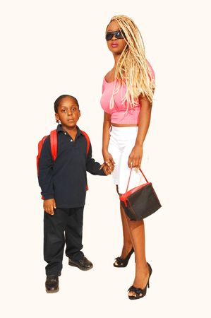 An older sister try to teach her younger brother how to go to school の写真素材