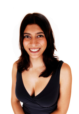 A closeup portrait of a young smiling woman in a black dress, isolatedon white background の写真素材