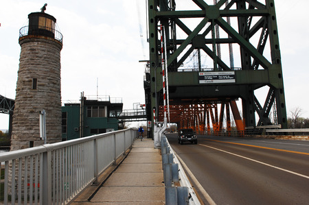 A closeup picture of the lift bridge and the old lighthouse in Burlington, Ontario の写真素材