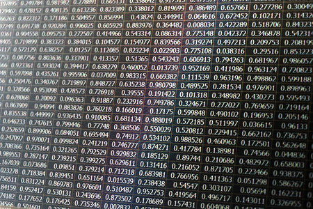 Random data as numbers captured from a laptop screen with inverted color effect appliedの写真素材