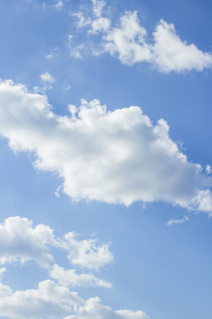 white clouds in the blue skyの写真素材