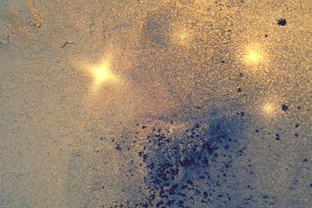 Shining dark blue and yellow marble pattern with golden dust