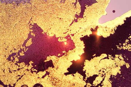 Vinatge abstract gold, and maroon marble texture with sparkles
