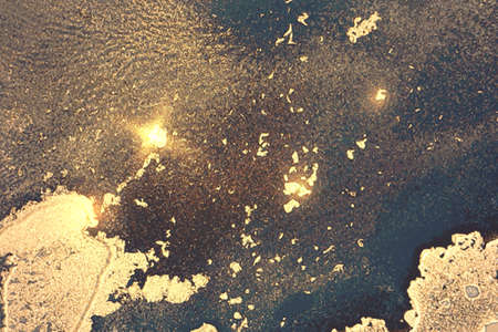 Gray, indigo and gold abstract marble pattern with sparkles