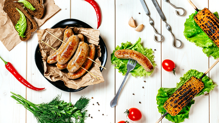 Food from spain, chorizo sausage slices or salami pepperoni, traditional spanish tapas, overhead.の写真素材