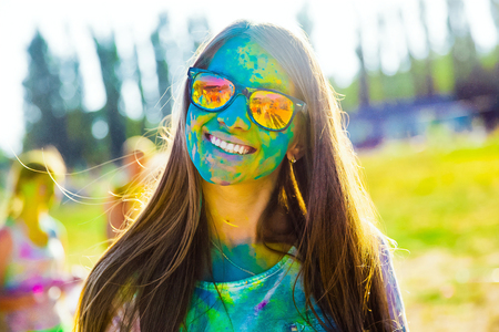 KRASNODAR, KRASNODAR REGION, RUSSIA 04.05.2018 :: nice girl in glasses at the Holi festival of colors in Russiaのeditorial素材