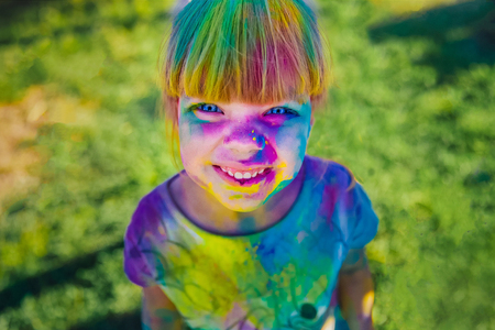 KRASNODAR, KRASNODAR REGION, RUSSIA 04.05.2018 :: Little girl child with blue eyes at the Holi festival of colors in Russiaのeditorial素材