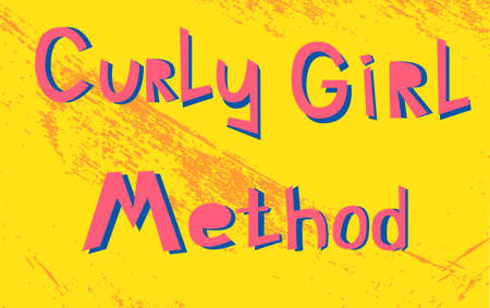 Vector illustration with handwritten pink lettering on yellow Curly girl methodのイラスト素材