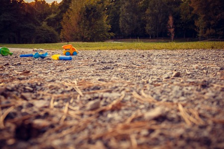 Children's toys on the road in the parkの写真素材