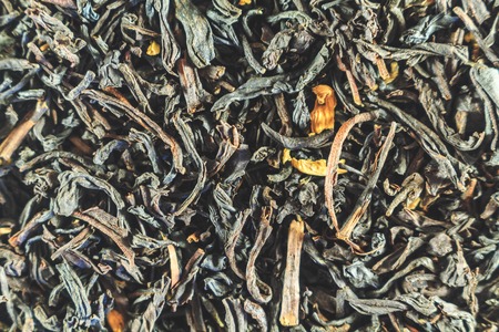 Black tea, dry leaves with flowers for all photosの写真素材