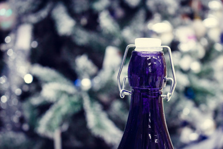 New Year's champagne. Throat with a blue bottle stopper.の写真素材