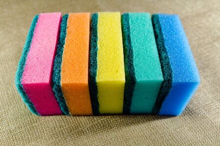 Multi-colored sponges in a row. Microfiber material. Dish washing.の写真素材