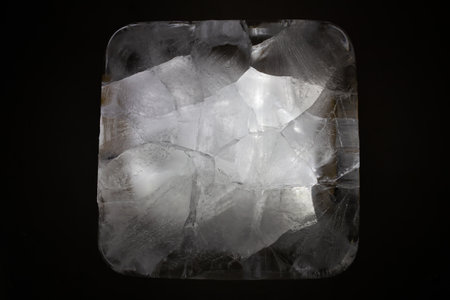 Abstract crystalline structure in a square frame against dark background
