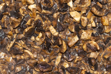 Chopped mushrooms close-up texture background culinary ingredient food preparationの写真素材