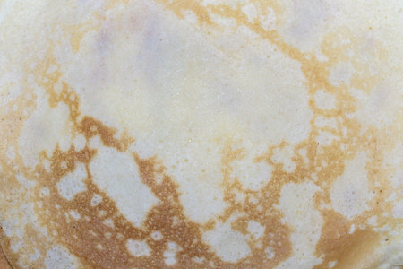 Delicious golden brown homemade pancake texture surface background pattern food