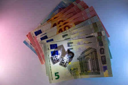 Gambling With Euro Money And Dice On Black Background