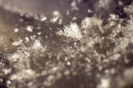 Frozen ice texture glistening shards reflecting light winter wonderland abstract backgroundの写真素材