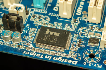 A detailed electronic circuit board with microchip and connectors for computer technology...