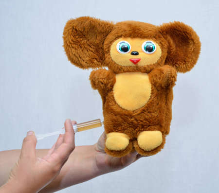 On white background, are made hands, toy, medication. の写真素材