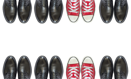 red sneakers and man business shoesの写真素材