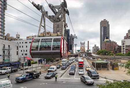 NEW YORK, USA - SEPTEMBER 26, 2013: traffic on East 60th Street of Manhattan and Queensboro Bridge...