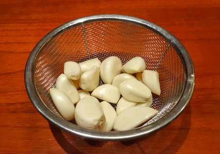 Garlic in basketの写真素材