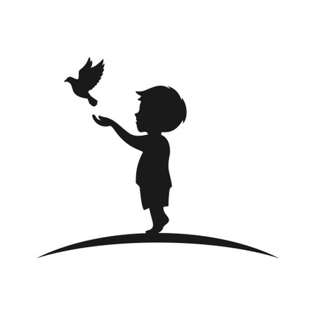 silhouette of boy releasing bird from his hands happilyのイラスト素材