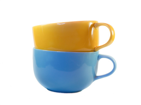 Big yellow and blue soup glance cup isolated on whiteの写真素材