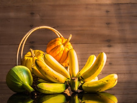 Banana  pumpkins and calabash  portrait still life の写真素材