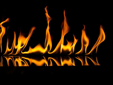 Fire flames on a black backgroundの写真素材