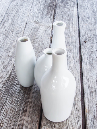 White Vases on wood backgroundの写真素材