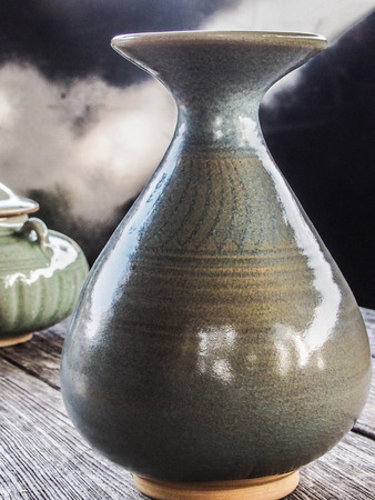 Black vase isolated on ablack backgroundの写真素材