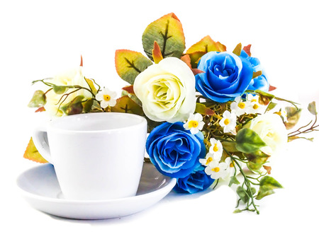 a cup with blue flowers isolated on a white background の写真素材