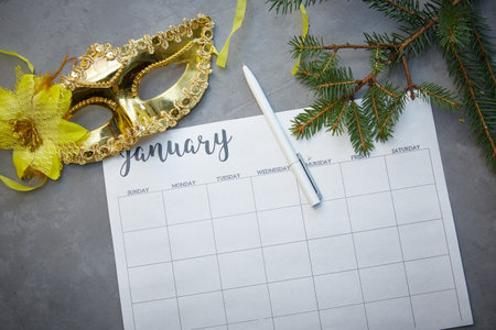 Planning for the next year. Mask next to the planner.