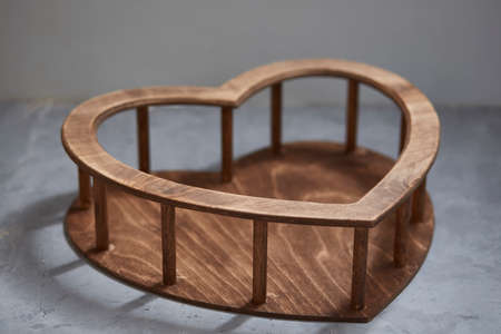 Wooden heart for photographing newborn babies. Props for newborn photographers.の写真素材