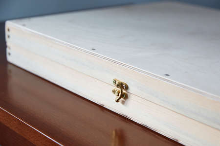 Lock on a wooden casket close-up. Copy space.の写真素材