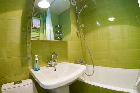 small bathroom. With sink, bathroom and mirrored cabinetsの写真素材