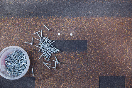 Nails for fixing the soft roof of the roof. Copy space.の写真素材