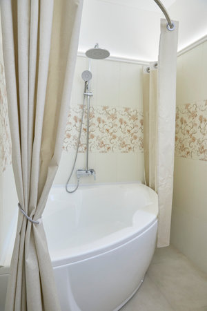 Bathroom with shower in light colours.の写真素材