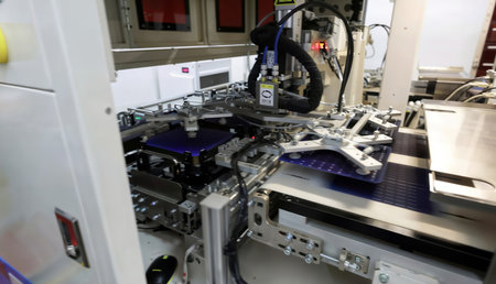 Interior of a modern factory for the production of solar panels.