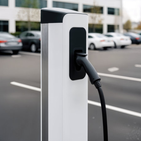 Electric vehicle charging station in a parking lot.の素材
