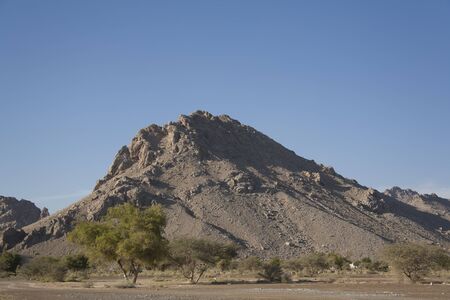 Desert landscape in Oman, mountains and blue sky, no body.の写真素材