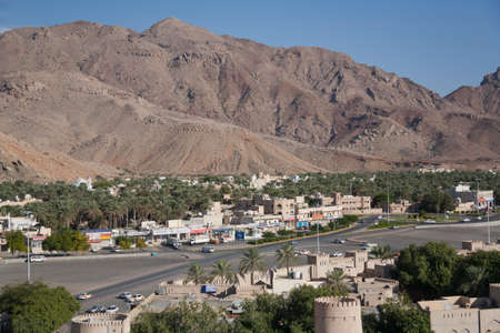 Small town, Sultanate of Oman, Middle east, travel by car, nature, mountains landscape and tradition buildings.のeditorial素材