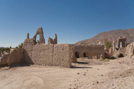 Stone walls of a collapsed city in Oman, an ancient city, ruins, remnants of civilization, the middle East.の写真素材